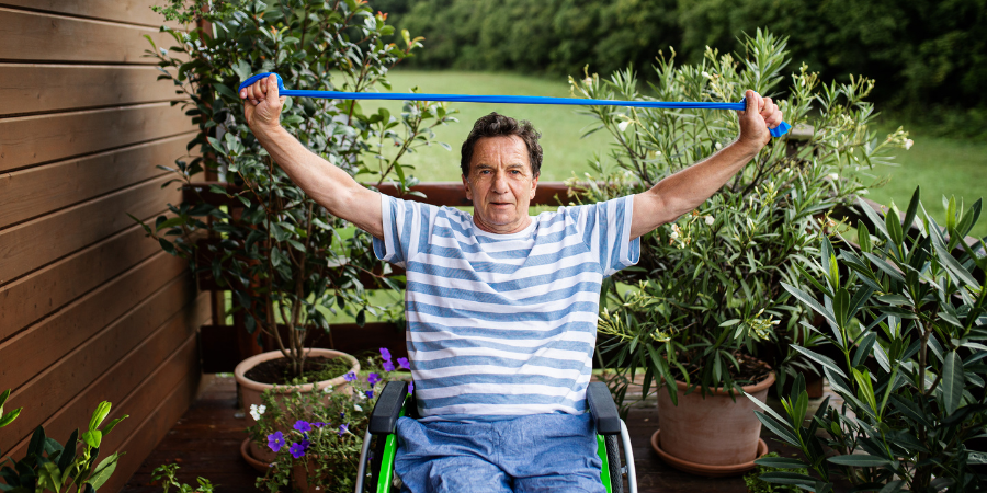 Man in wheelchair working out