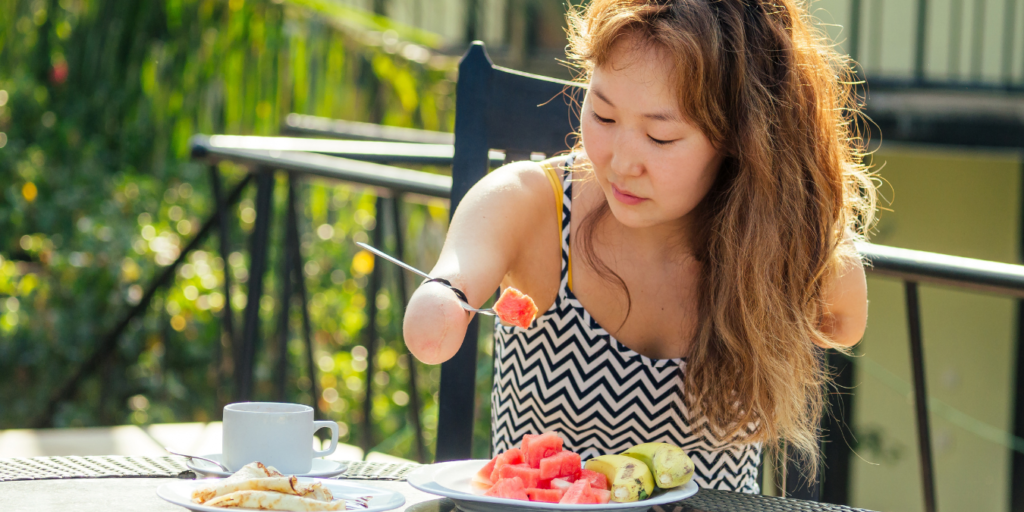 Woman eating watermelon