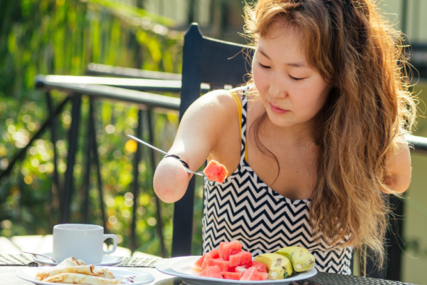 Woman eating watermelon