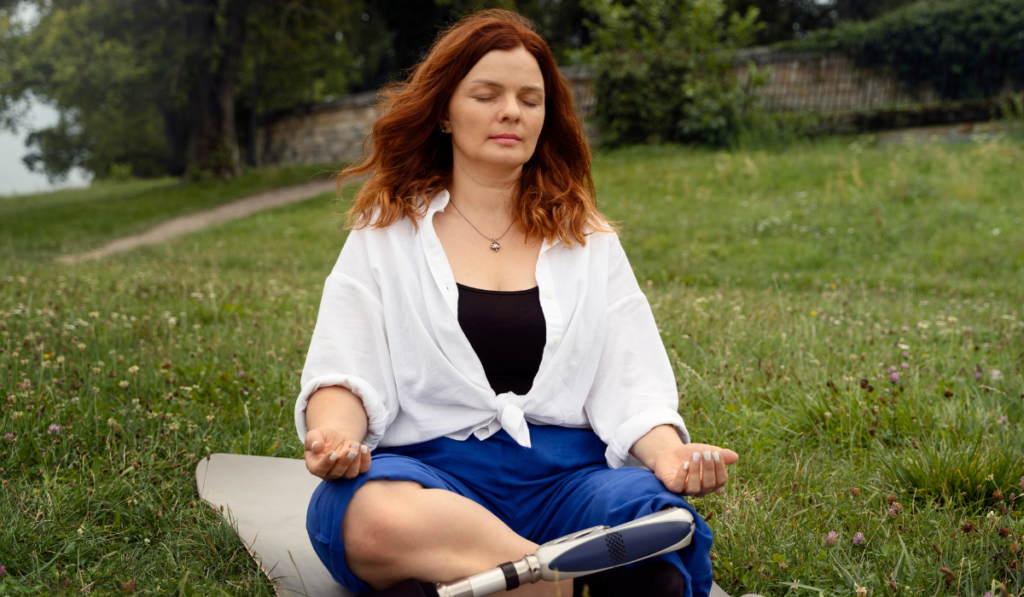 Woman meditating outdoors