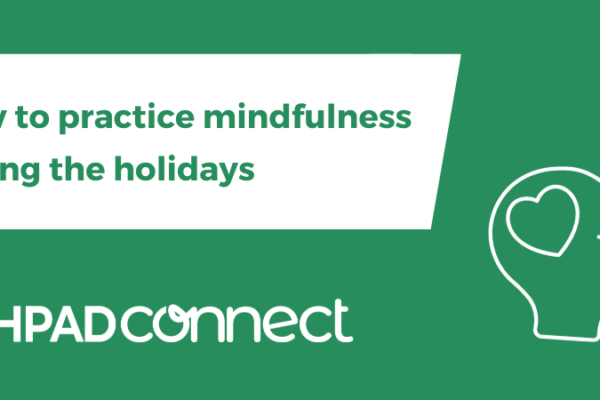 A green graphic with the words How to practice mindfulness during the holidays on it with the NCHPAD Connect logo and an illustration of a person's head with a heart over the mind.